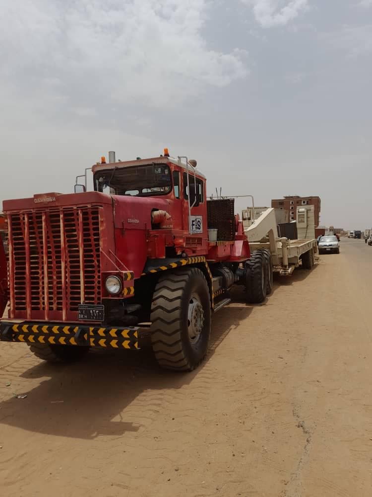 Heavy vehicle representing agricultural equipment supply and movement
