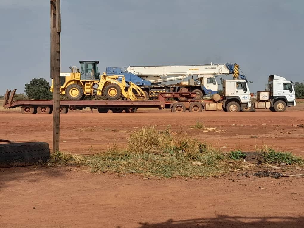 FIS heavy-haul convoy transporting equipment to a field location